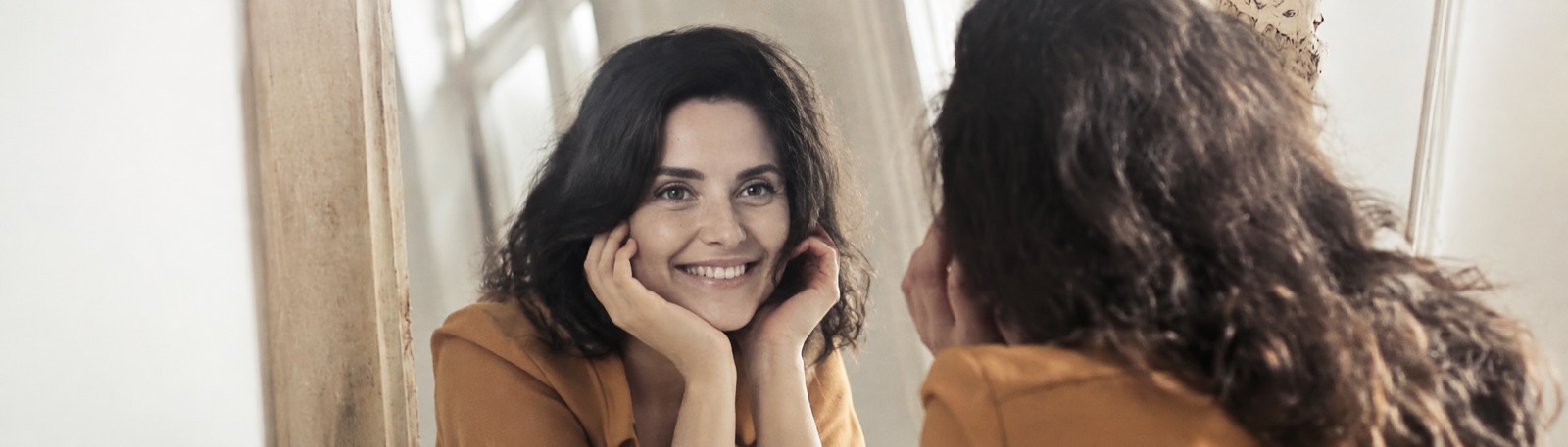 A smile at your own reflection